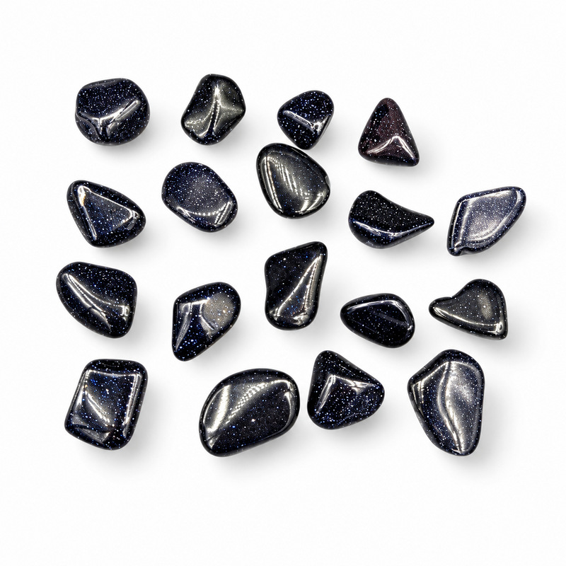 A set of polished blue goldstone tumbled, arranged on a clean white background.