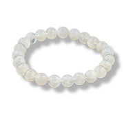 White beaded bracelet on a white background