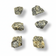 Six rough labradorite pieces arranged in two columns on a plain white background, each casting a soft shadow.