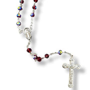 Glass Birthstone Rosary for January on a white background