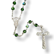 Glass Birthstone Rosary for May on a white background