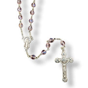 Glass Birthstone Rosary for June on a white background