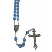 Blue rosary with silver cross on a white background