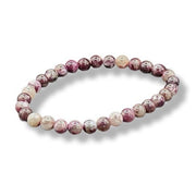 Multicolored beaded bracelet on a white background