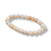Beaded bracelet with gradient colors on a white background