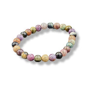 Multicolored beaded bracelet on a white background