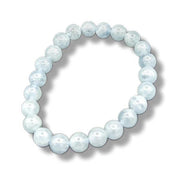 Light blue beaded bracelet on a white background