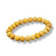 Wooden beaded bracelet on a white background
