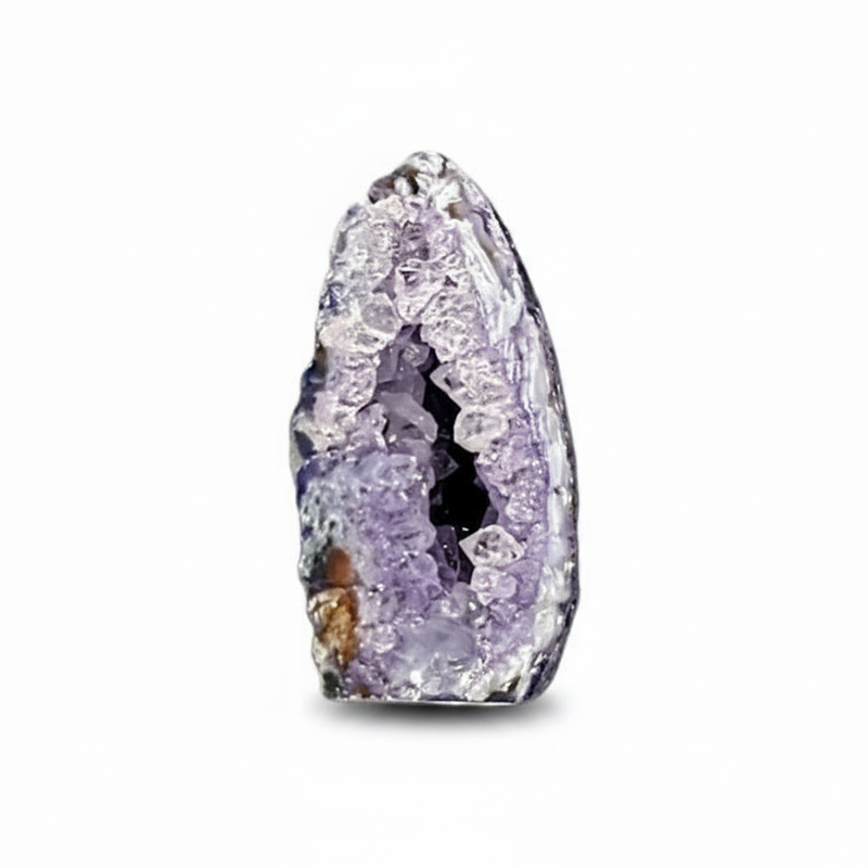 A raw agate geode specimen with a purple crystalline interior  photographed on a clean white background.