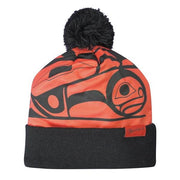 Black and red beanie with a pom-pom on a white background
