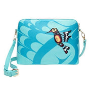 Blue crossbody bag with a bird design on a white background