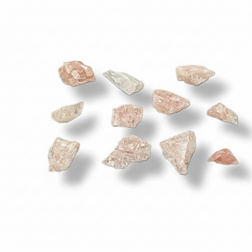 Nine raw, rough pink and peach-colored crystal chunks of various sizes, arranged in a grid on a clean white background with soft drop shadows.