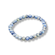 Blue beaded bracelet on a white background