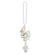 Decorative car charm with musical note design on a white background