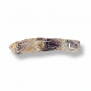 A natural amethyst crystal point with visible purple and yellow inclusions, shown on a clean white background with a soft drop shadow.