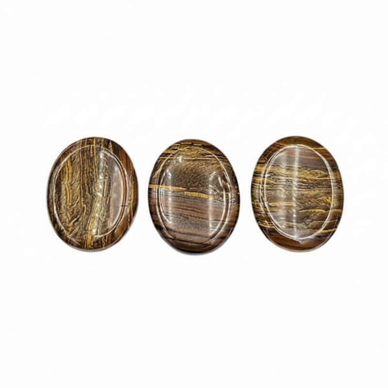 Tiger's Eye worry stones on a white background