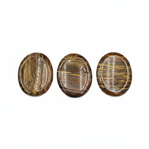 Tiger's Eye worry stones on a white background
