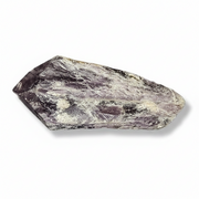 Amethyst piece shown on a clean white background with a soft drop shadow.