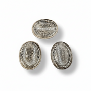 Smokey Quartz worry stones on a white background