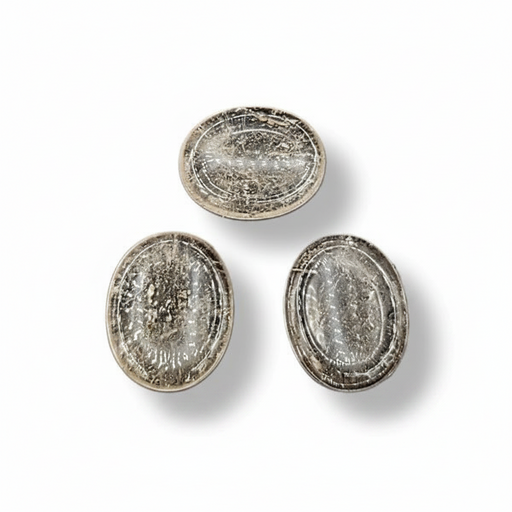 Smokey Quartz worry stones on a white background