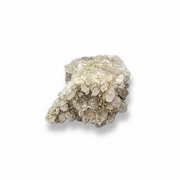 A smokey quartz cluster on a white background