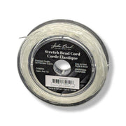 Spool of stretch bead cord with label on a white background