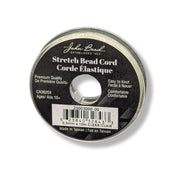Spool of stretch bead cord with label on a white background