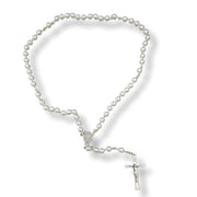 Glass Pearl rosary necklace with a cross on a white background