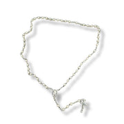 Pearl rosary on a white background