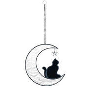 Decorative suncatcher of a hanging moon with a cat silhouette and star on a white background
