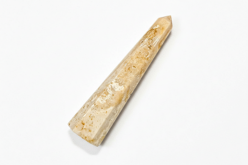A natural agate obelisk with a warm beige and light brown coloration, displayed diagonally on a clean white background.