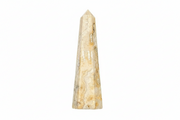 Agate Obelisk on a white background.