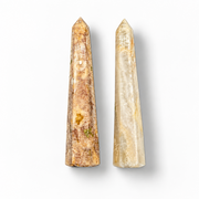 Two agate obelisks on a white background.