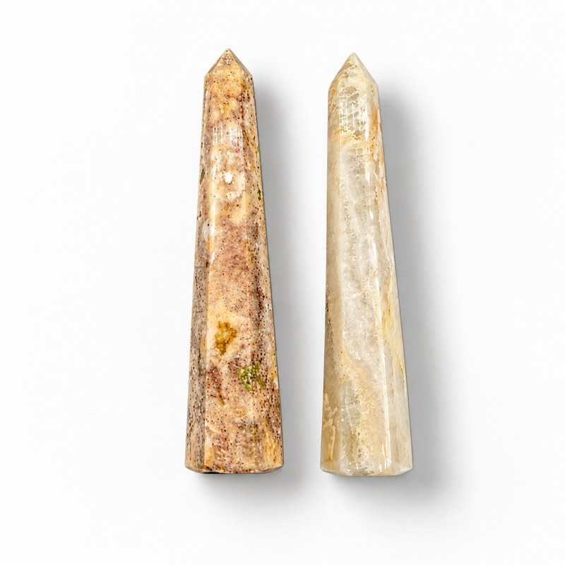 Two agate obelisks on a white background.