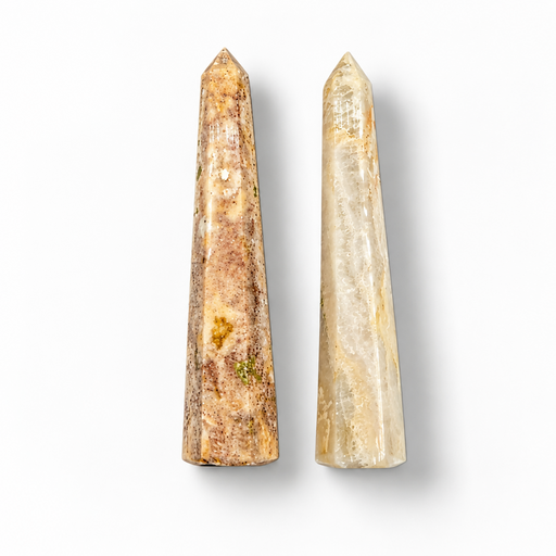 Two agate obelisks on a white background.