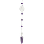 Pendulum with purple beads and a silver chain on a white background