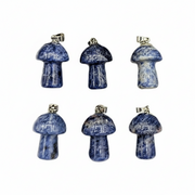 Set of five blue and white mushroom-shaped pendants on a white background