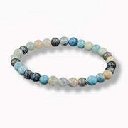 Multicolored beaded bracelet on a white background
