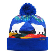 Colorful beanie with polar bear design and blue pom-pom on a white background