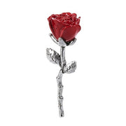 Red rose with silver stem on a white background