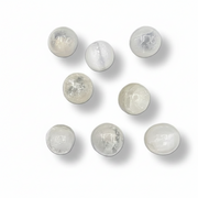 Selenite tumbled on a white background