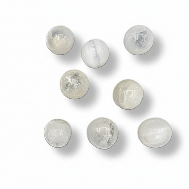 Selenite tumbled on a white background