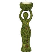 Green candle holder shaped like a person holding a nest with a candle on a white background