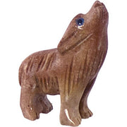 Brown ceramic wolf figurine on a white background