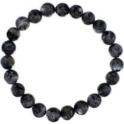 Black beaded bracelet on a white background