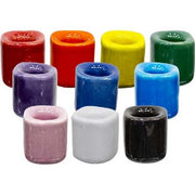 Set of colorful candle holders on a white background