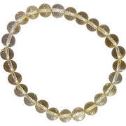 A bracelet made of round beads with a yellowish tint, representing the 6mm Citrine Bracelet.