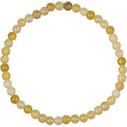 Yellow jade bracelet on a white background