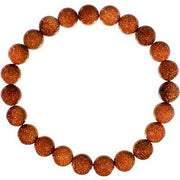 Bracelet made of brown beaded stones on a white background
