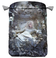 Decorative bag with a design of a woman in a white dress sitting on a throne, surrounded by flowers.